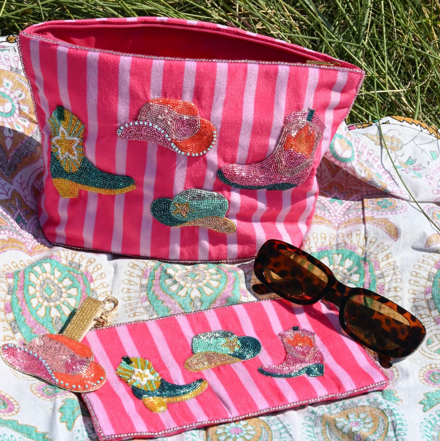 Handcrafted beaded coin purses inspired by vintage sardine tins.
