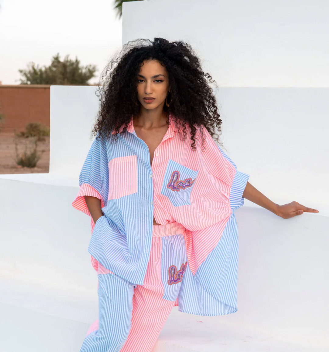 Pink embroidered maxi dress with bohemian style and flowy fit