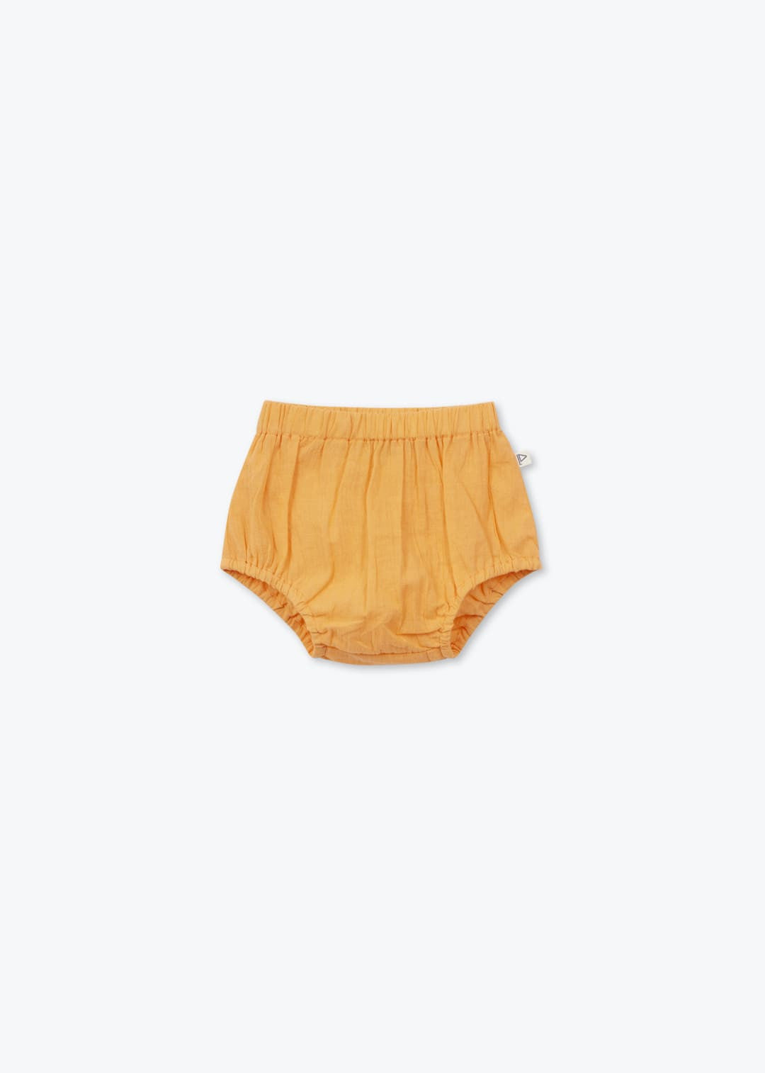 baby organic cotton bloomer shorts in lightweight voile fabric in warm orange color