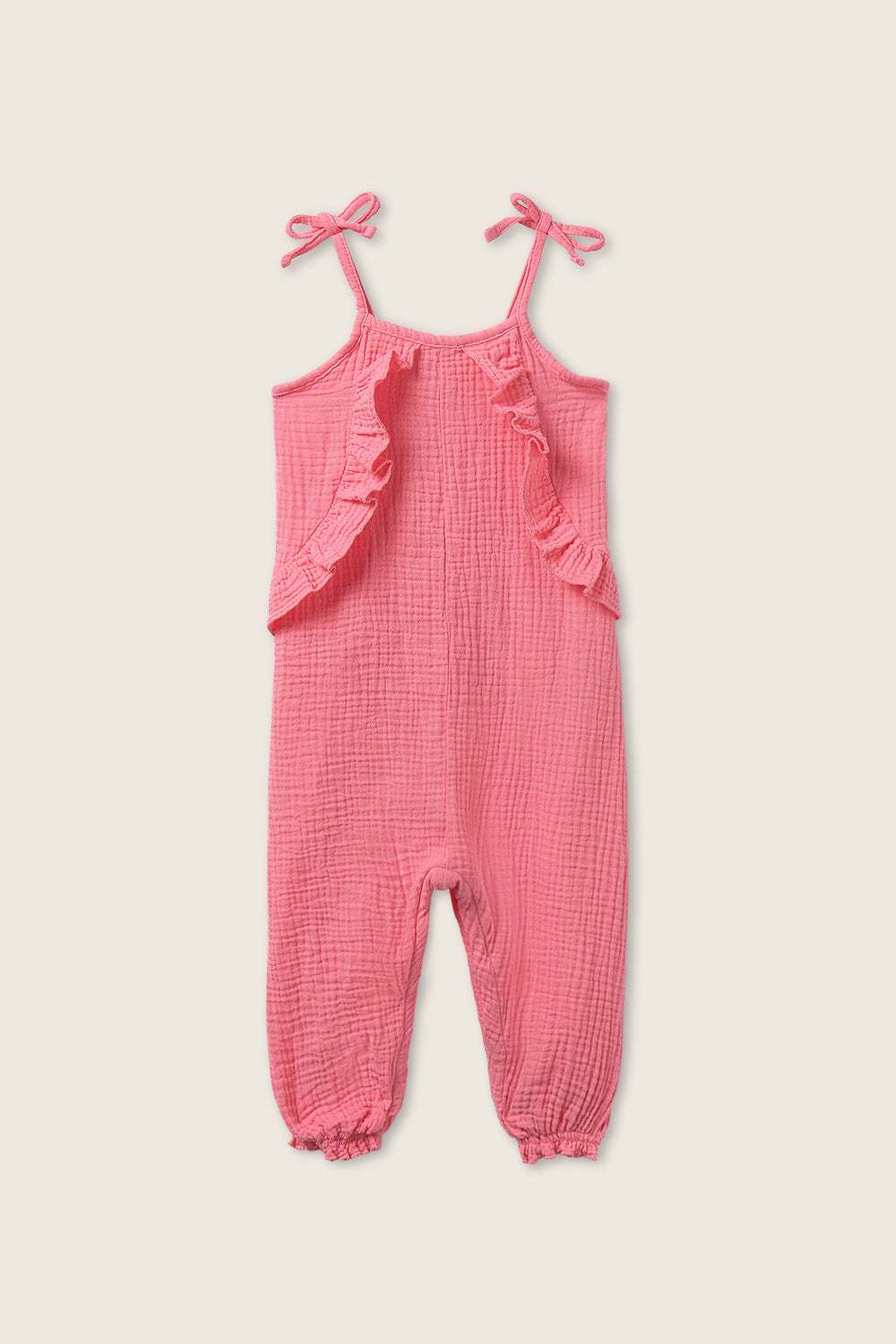 Baby sleeveless cotton gauze shirt in pink with ruffle front detail