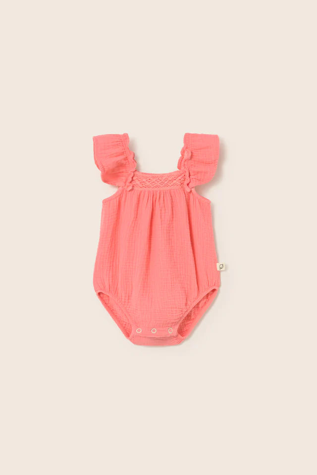 Baby girl cotton gauze romper with flutter sleeves in soft pastel color