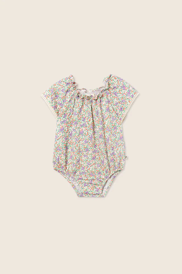 Baby girls cotton voile bubble romper with colorful floral print and flutter sleeves
