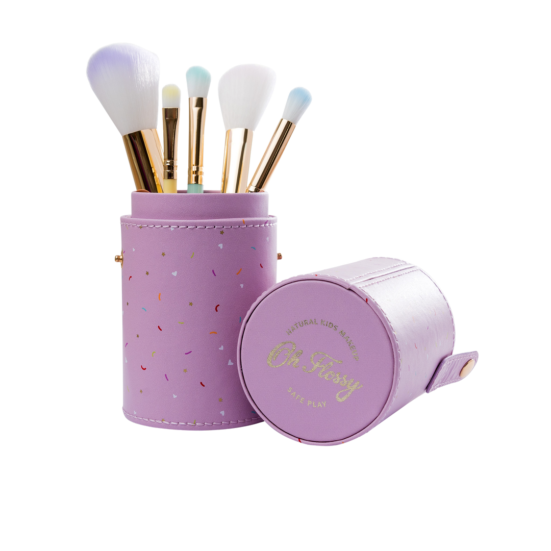 Kids 5-piece rainbow makeup brush set with soft pastel brushes in a purple storage case