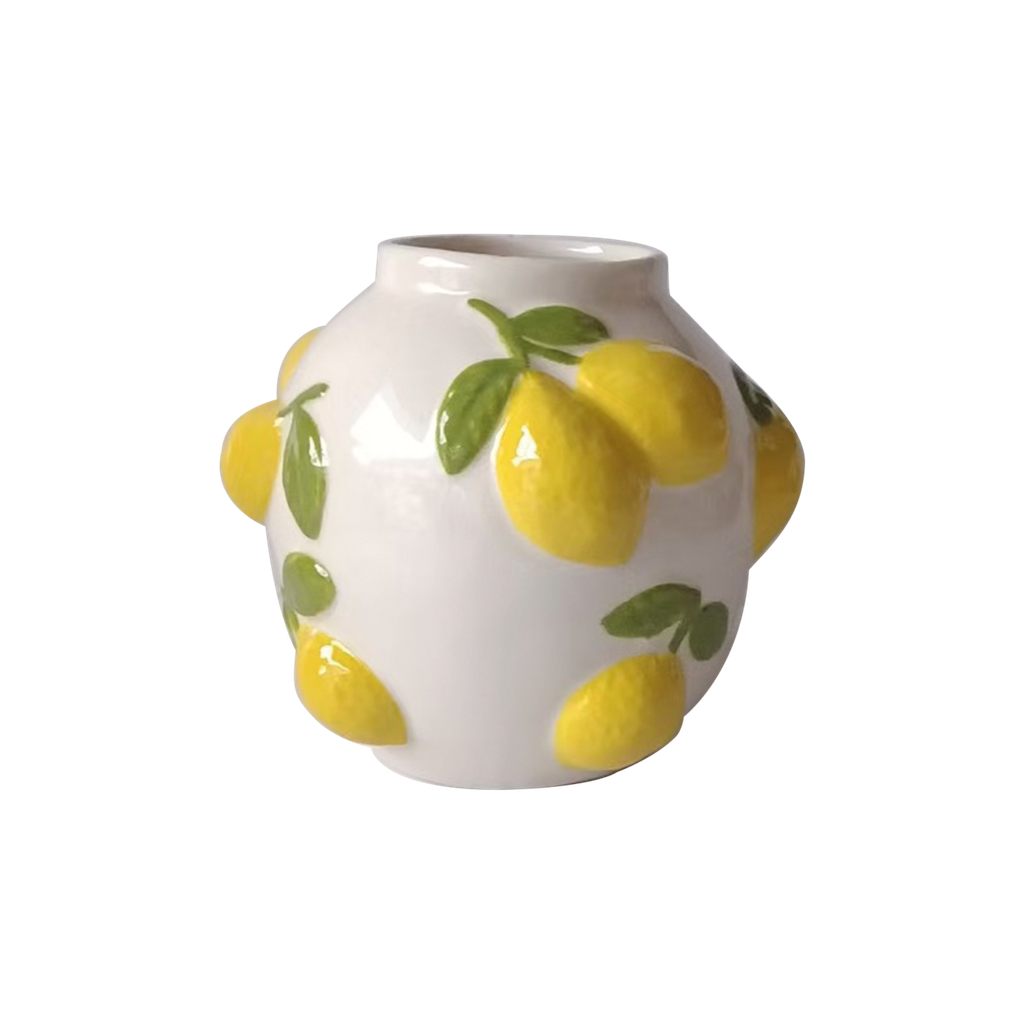 Rounded ceramic vase with sculpted yellow lemons and green leaves