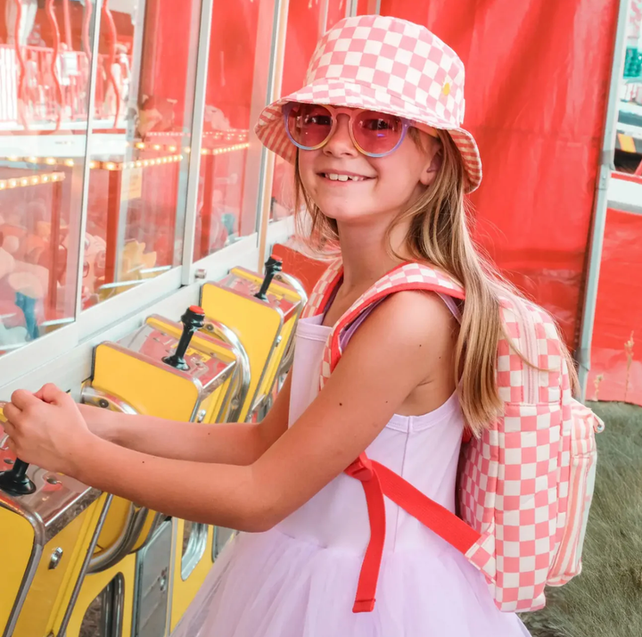Candy stripe reversible bucket hat for kids with playful summer prints on girl