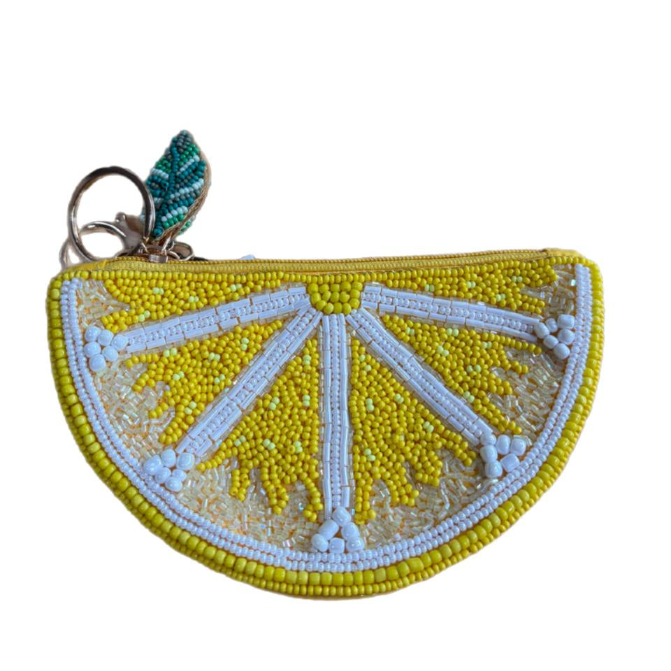 Yellow lemon slice beaded purse with white detailing, green leaf and keyring