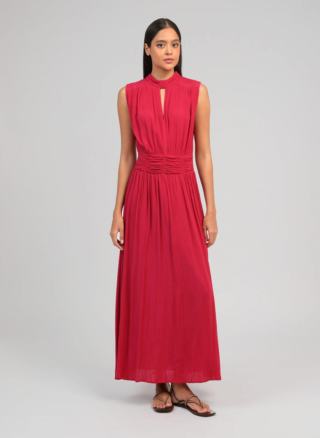 An’ge Orlany maxi dress with gathered waist and flowing sleeveless silhouette