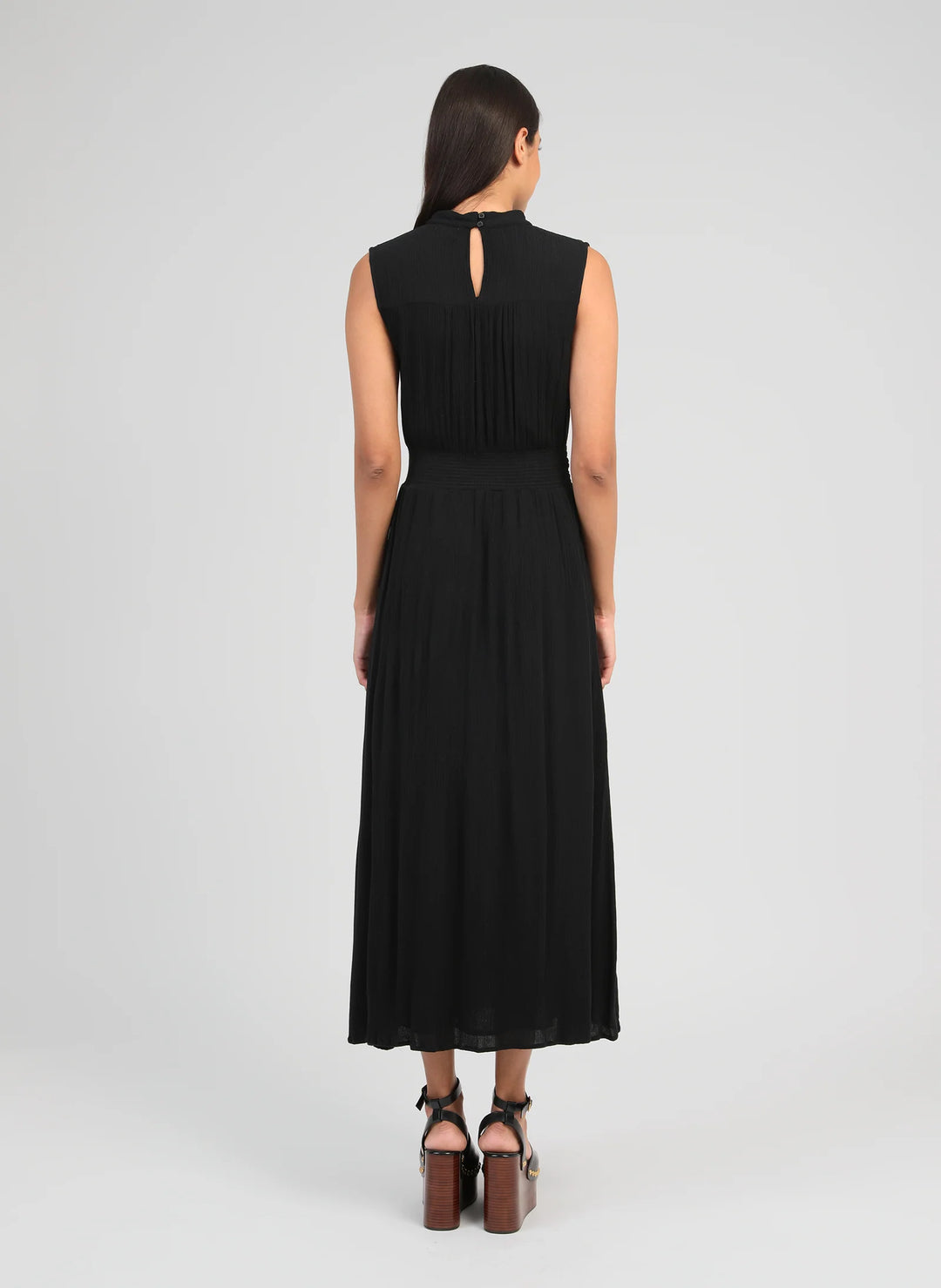 An’ge Orlany maxi dress with gathered waist and flowing sleeveless silhouette