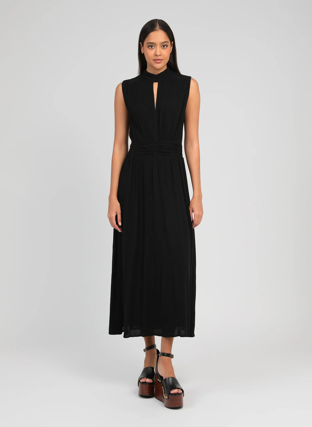An’ge Orlany maxi dress with gathered waist and flowing sleeveless silhouette