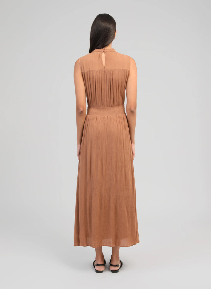 An’ge Orlany maxi dress with gathered waist and flowing sleeveless silhouette