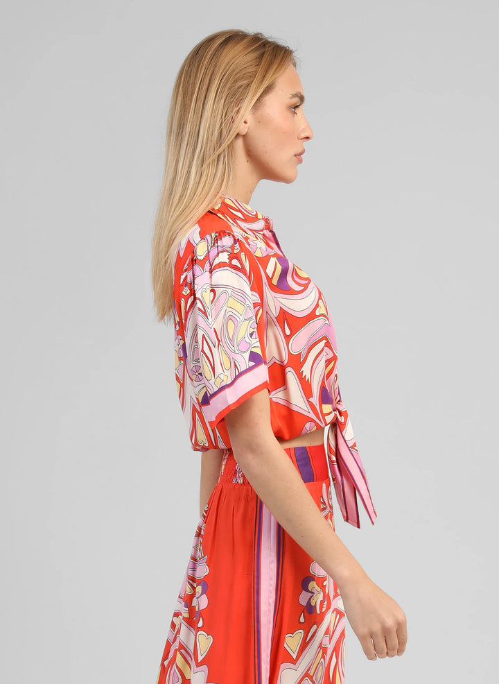 An’ge Suzalia Astola printed shirt in piment tones with retro pattern and front tie detail