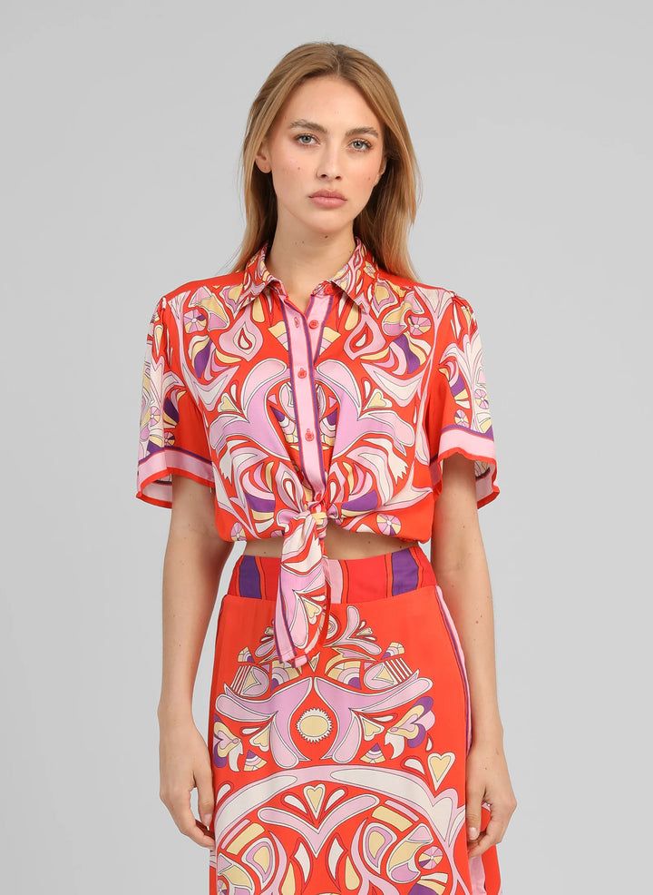 An’ge Suzalia Astola printed shirt in piment tones with retro pattern and front tie detail