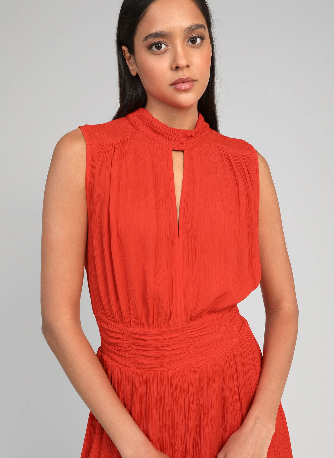 An’ge Orleane piment short dress with gathered waist and sleeveless flared silhouette