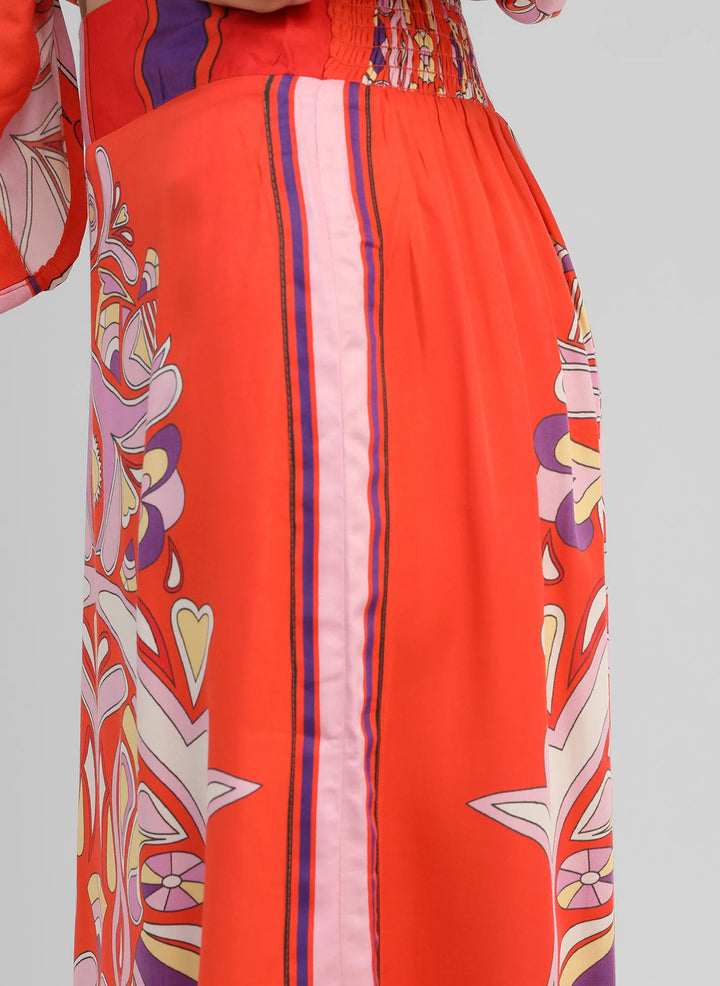 An’ge Robinson red printed midi skirt with vibrant retro-inspired pattern