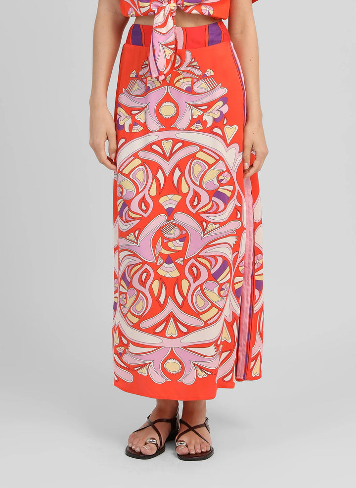 An’ge Robinson red printed midi skirt with vibrant retro-inspired pattern