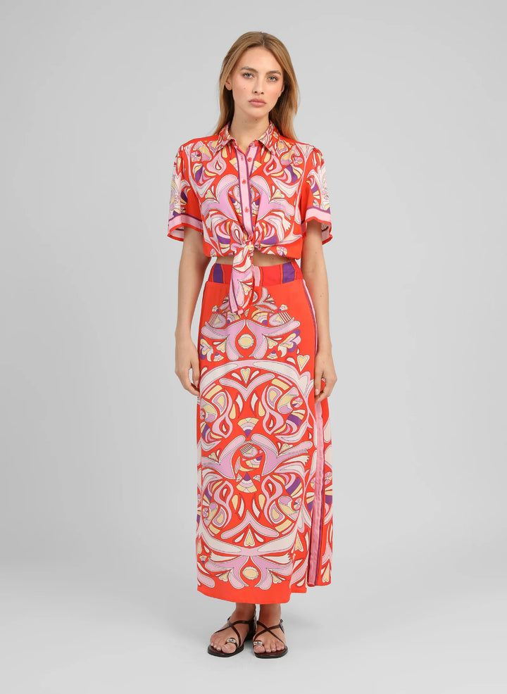 An’ge Robinson red printed midi skirt with vibrant retro-inspired pattern