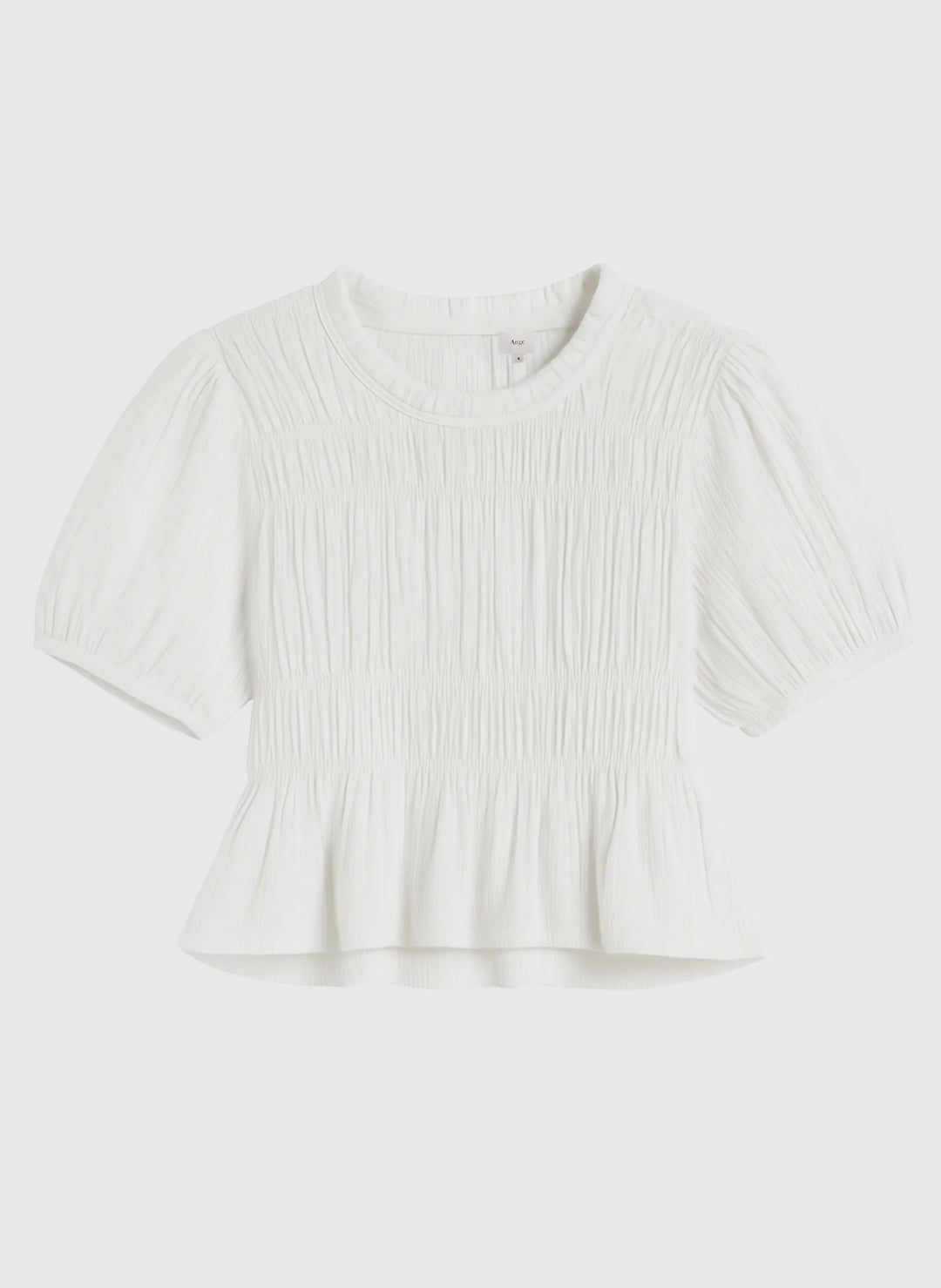 An’ge Sizaya smocked top with puff sleeves and peplum hem in lightweight textured fabric