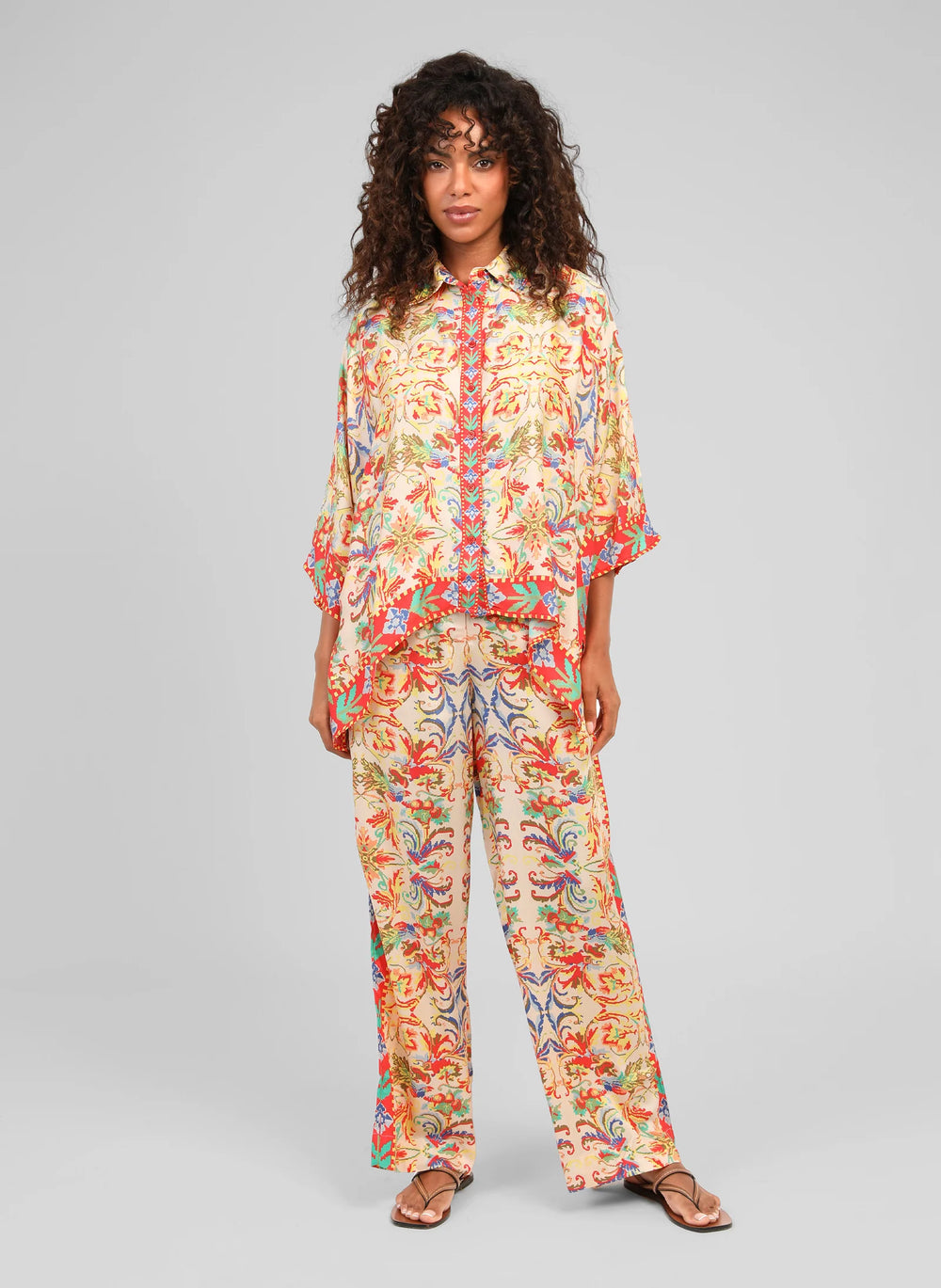 An’ge Rossana Merida ecru wide-leg trousers with colorful bohemian print