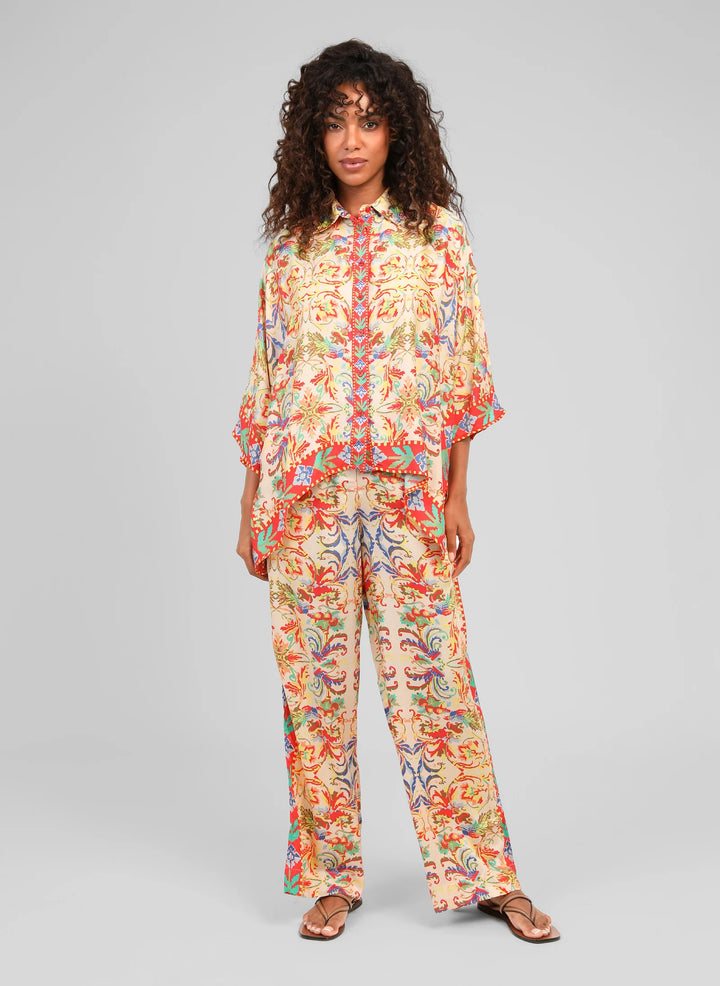 An’ge Rossana Merida ecru wide-leg trousers with colorful bohemian print