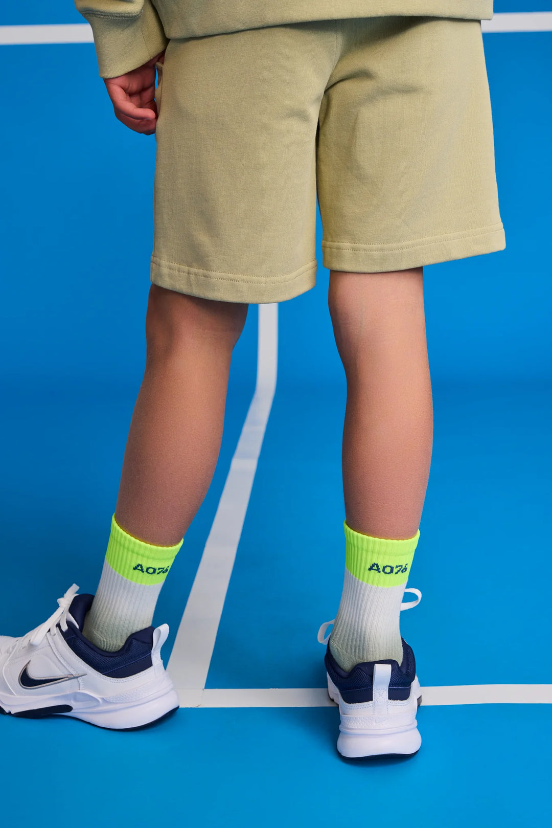 boys khaki green shorts with button closure
