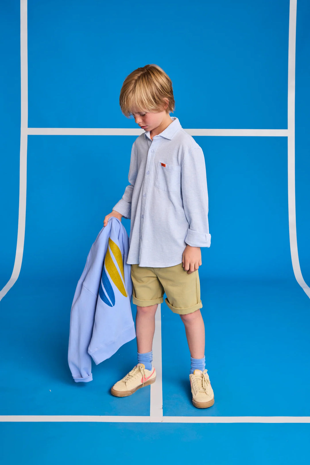 boys light blue long sleeve button down shirt with chest pocket
