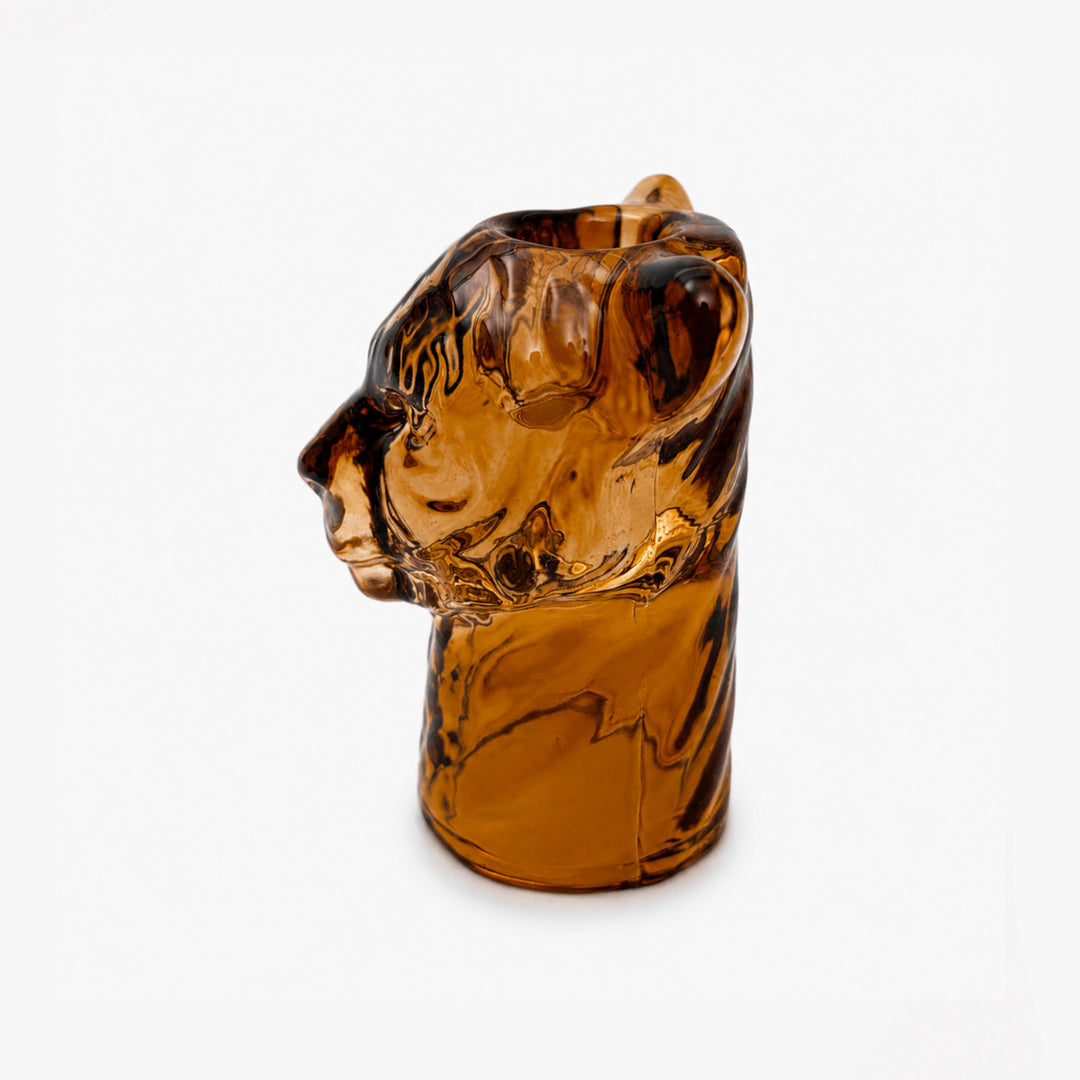 Lion glass candle holder with decorative animal-inspired design
