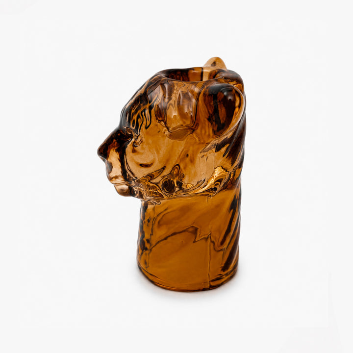 Lion glass candle holder with decorative animal-inspired design