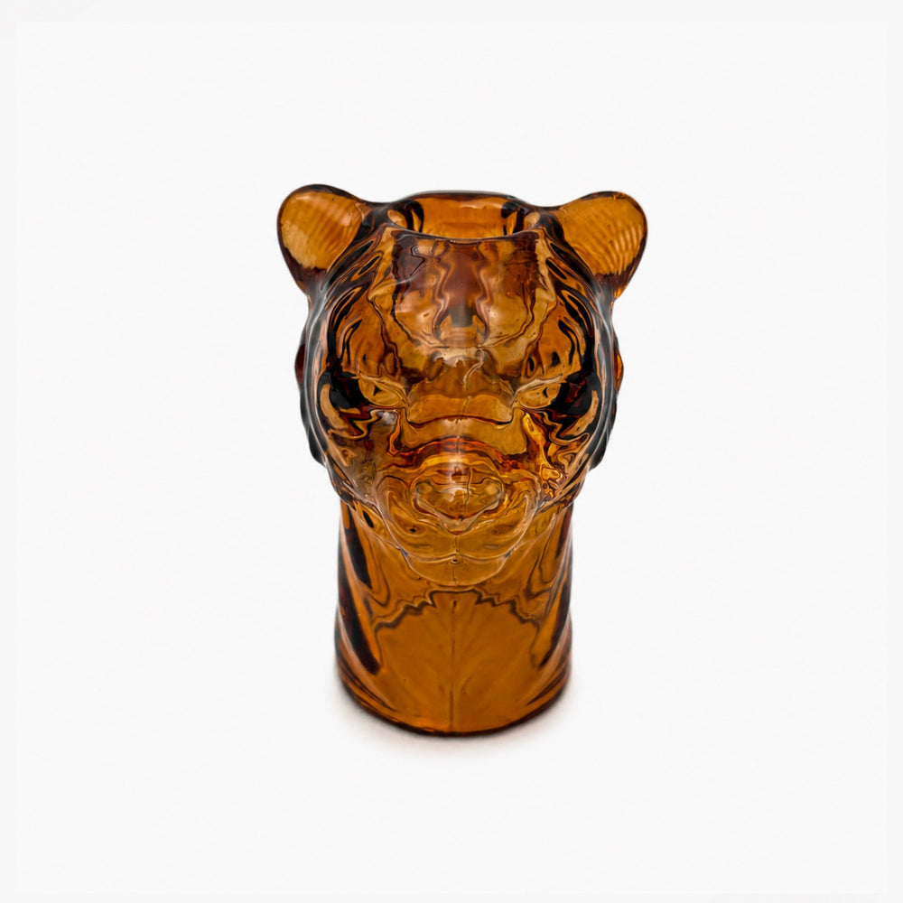 Lion glass candle holder with decorative animal-inspired design