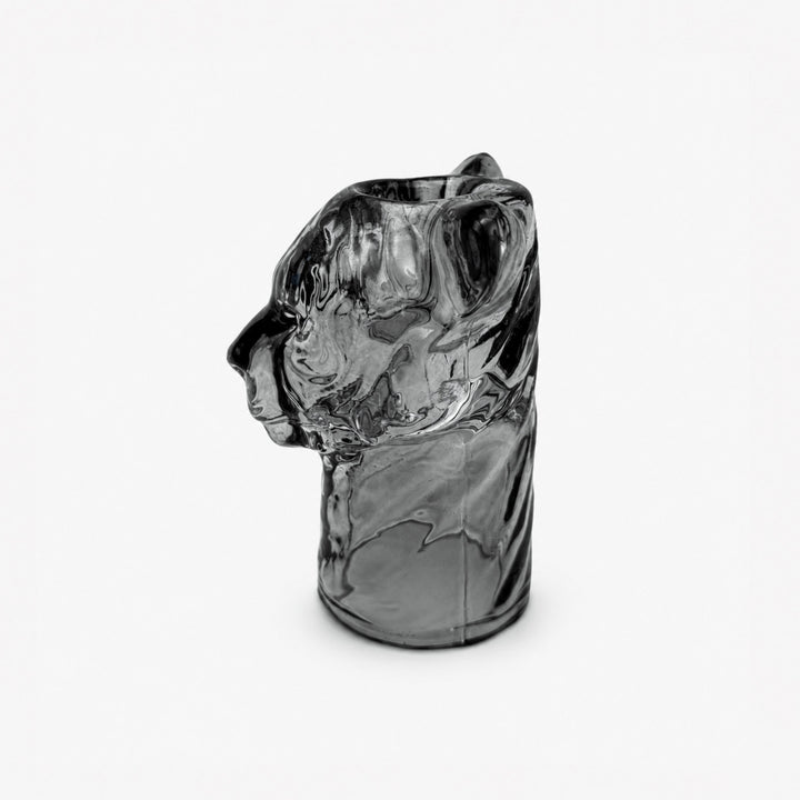 Lion glass candle holder with decorative animal-inspired design