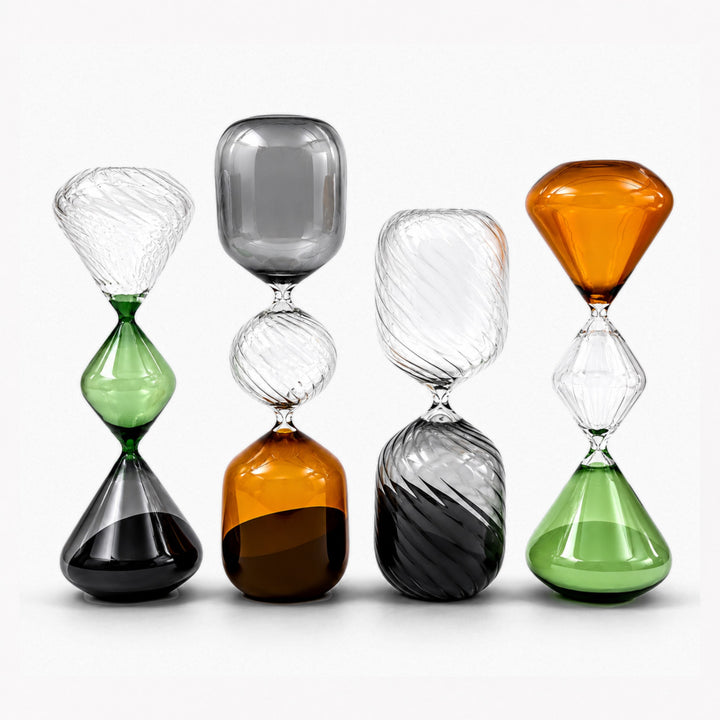 Large amber glass hourglass with elegant decorative design