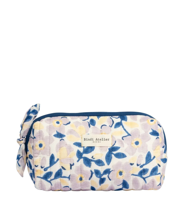Blue floral quilted beauty pouch by Bindi Atelier with soft botanical print and zip closure
