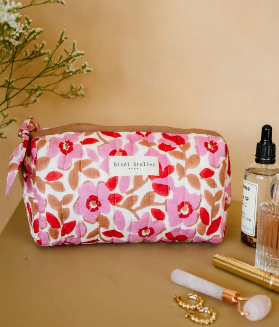Pink floral quilted beauty pouch by Bindi Atelier with romantic botanical print and zip closure