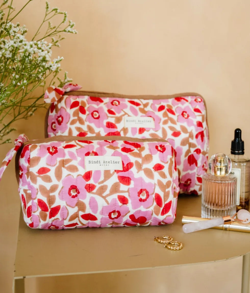 Pink floral quilted beauty pouch by Bindi Atelier with romantic botanical print and zip closure