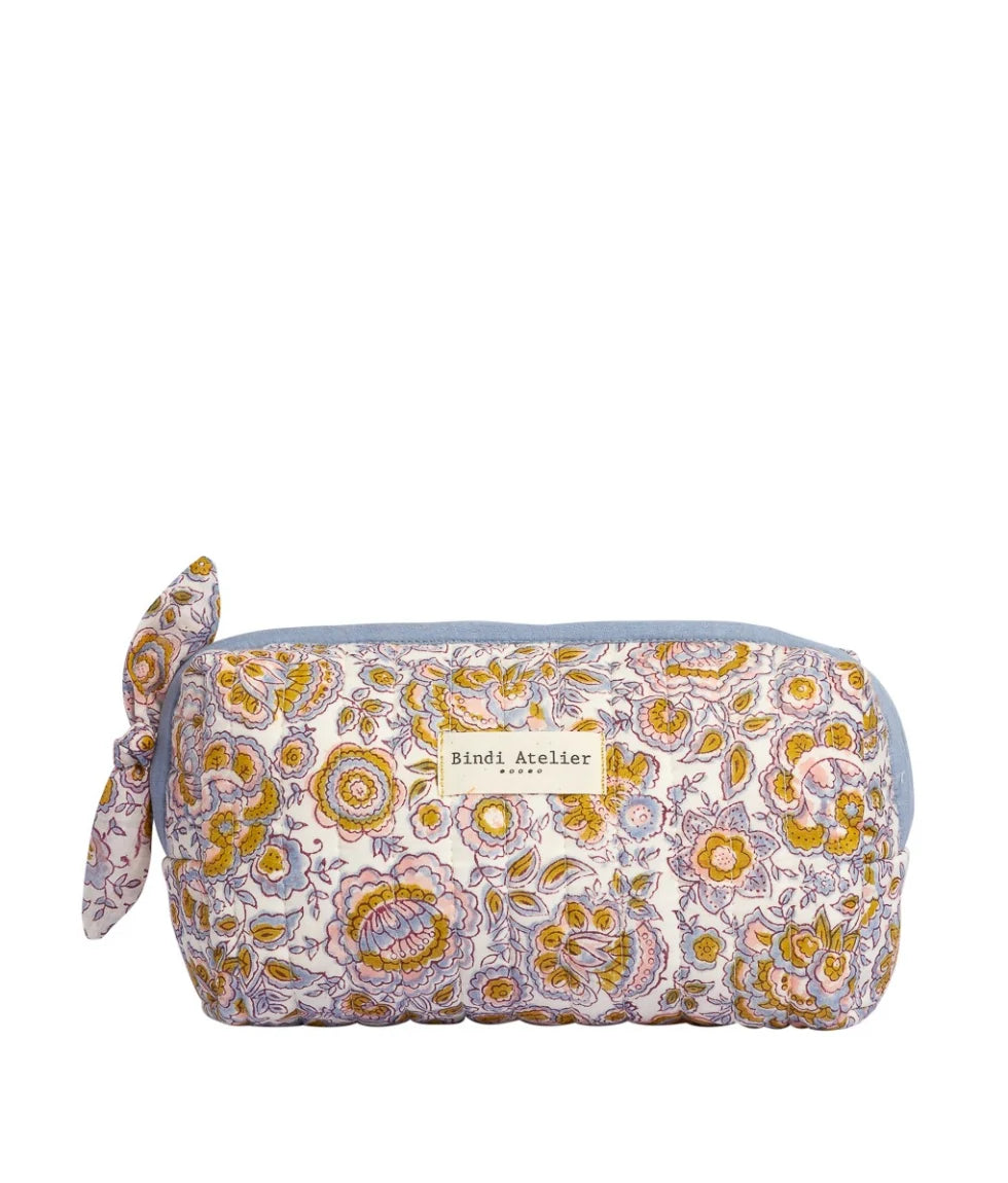 Blue floral quilted beauty pouch by Bindi Atelier with botanical block print and zip closure