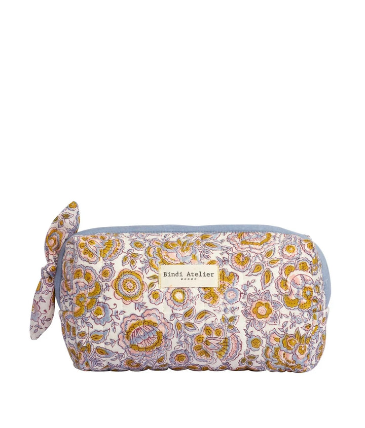 Blue floral quilted beauty pouch by Bindi Atelier with botanical block print and zip closure