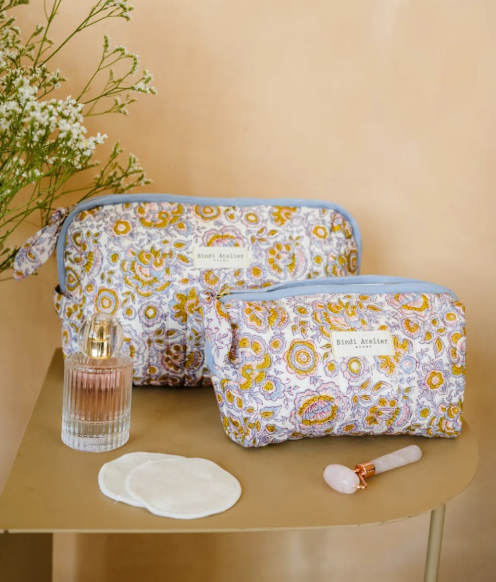 Blue floral quilted beauty pouch by Bindi Atelier with botanical block print and zip closure