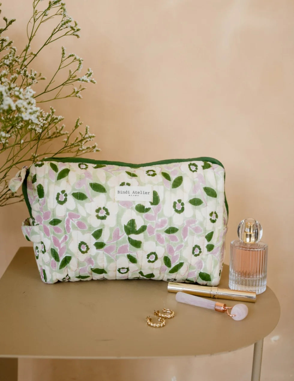 Floral quilted beauty pouch by Bindi Atelier in green and pink botanical print