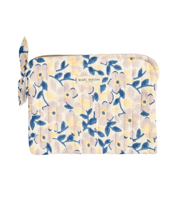 Blue floral quilted iPad pouch by Bindi Atelier with soft botanical print and zip closure