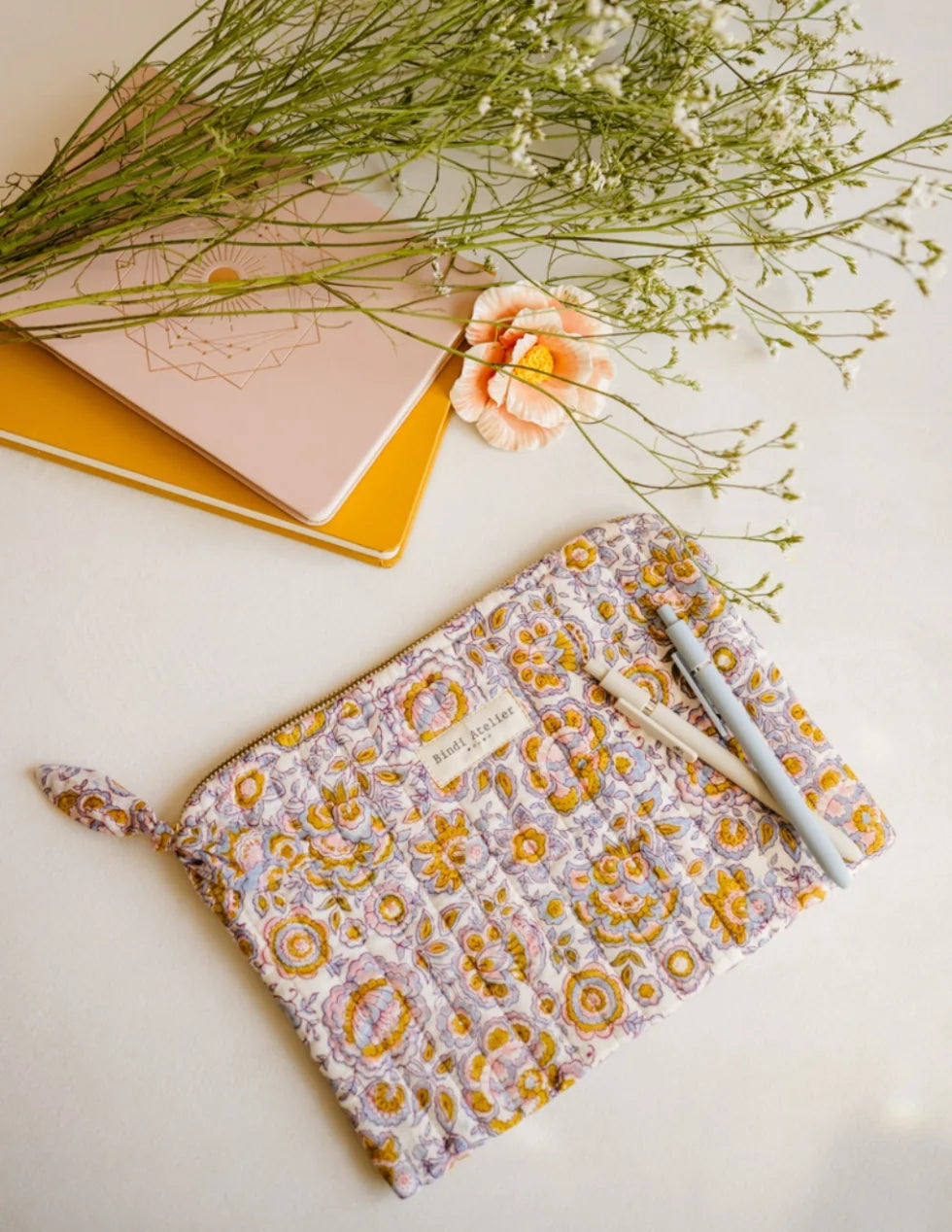 Quilted floral iPad pouch by Bindi Atelier with zip closure and pastel botanical print