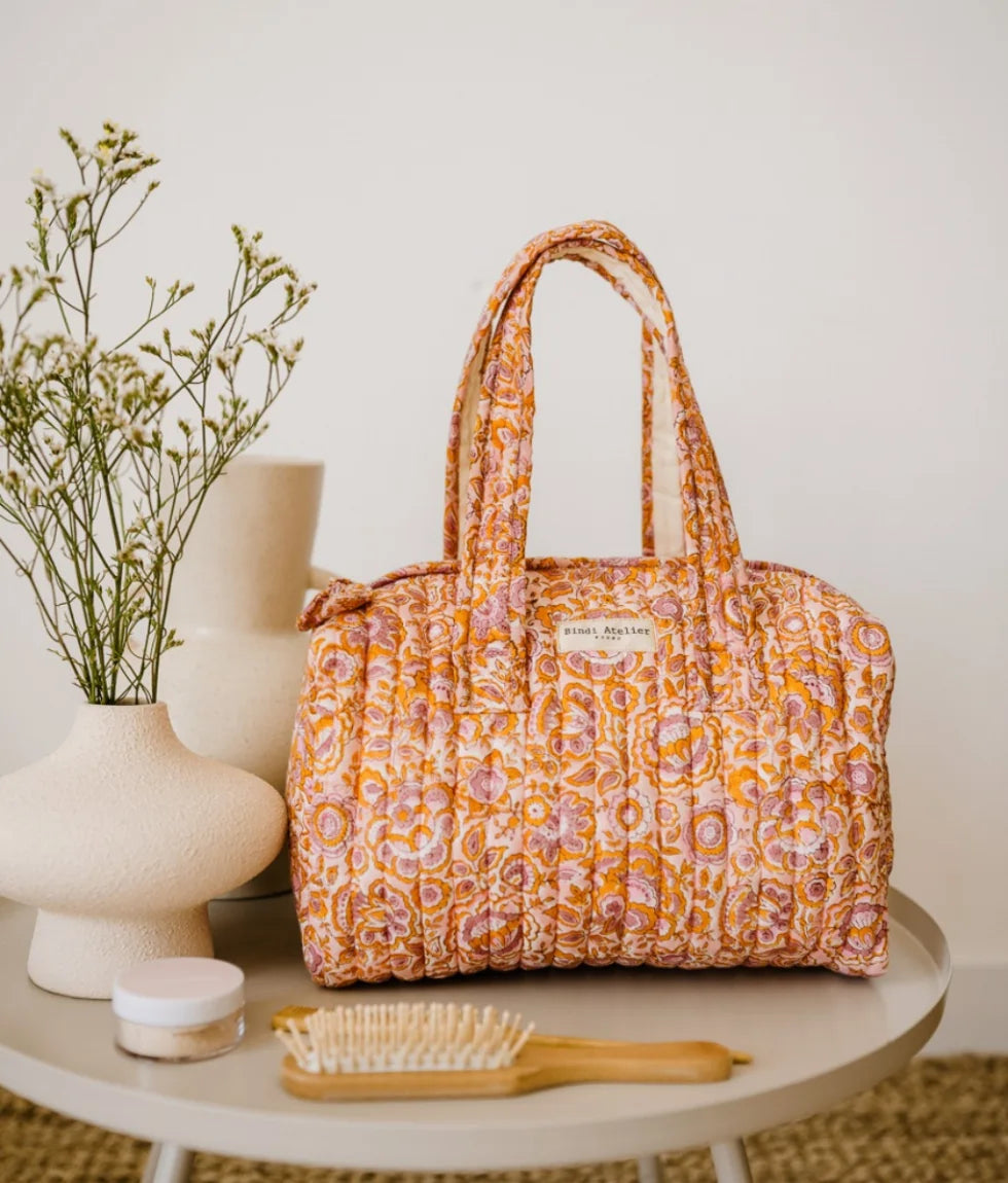 Pink floral quilted cotton vanity bag for travel and beauty essentials