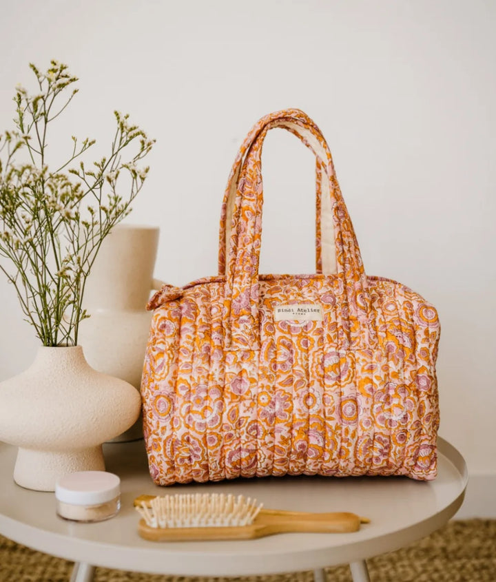 Pink floral quilted cotton vanity bag for travel and beauty essentials