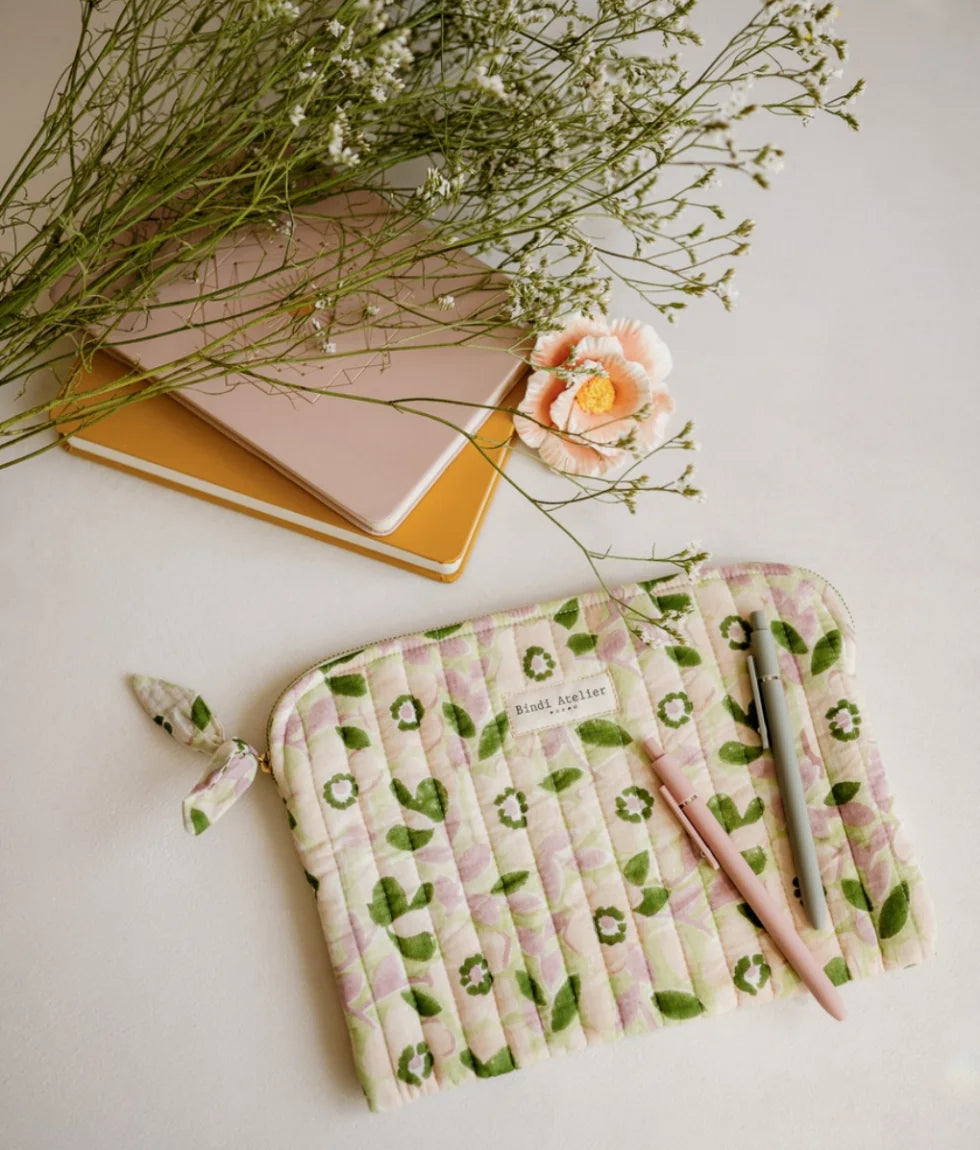 Green floral quilted iPad pouch by Bindi Atelier with soft botanical print and zip closure