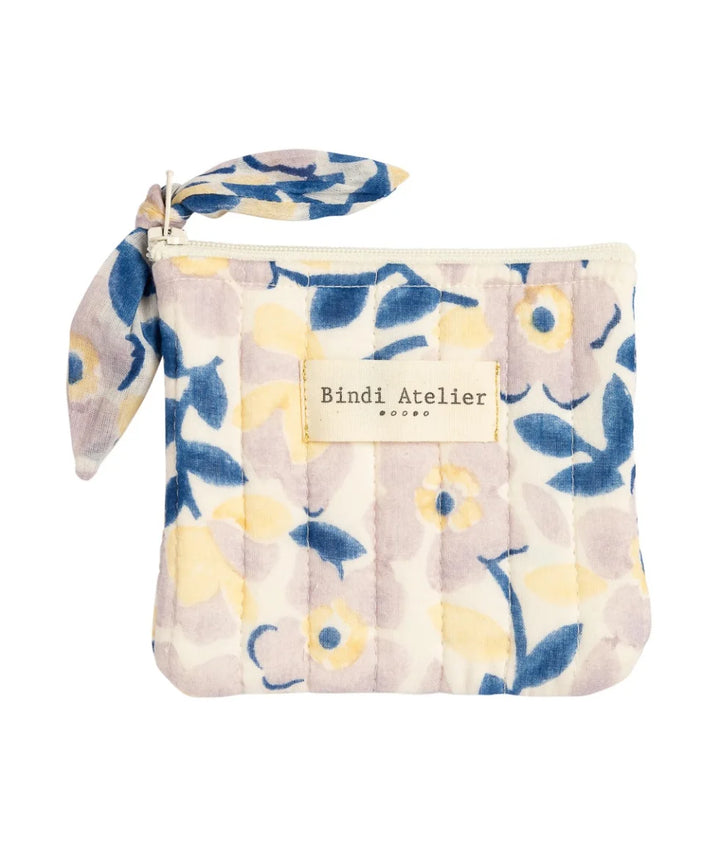 Small quilted blue floral coin purse by Bindi Atelier with soft botanical print and zip closure