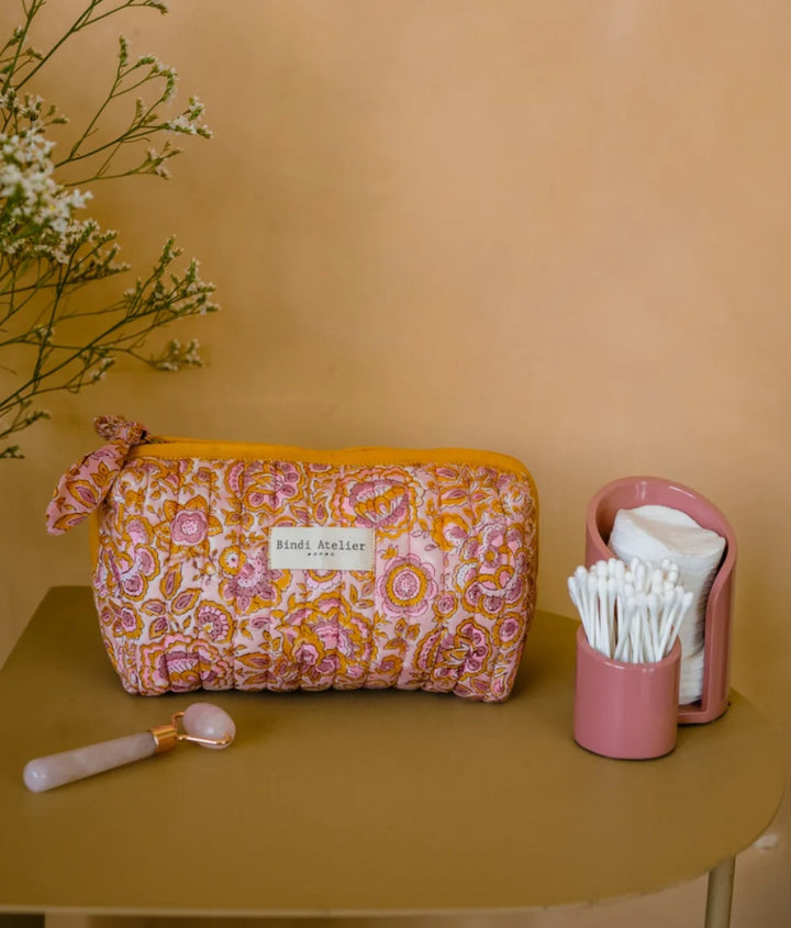 Floral quilted beauty pouch by Bindi Atelier in pink and ochre vintage floral print
