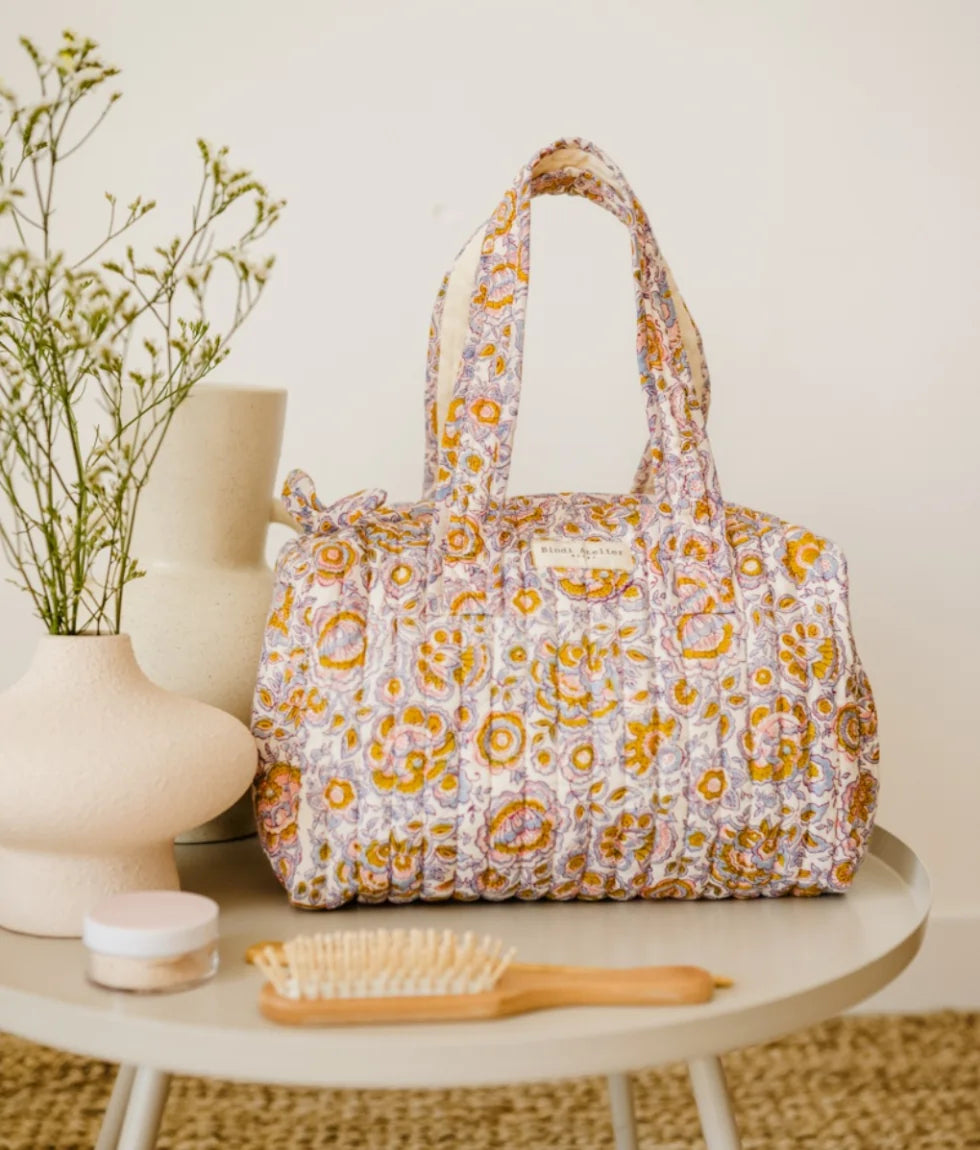 Floral quilted cotton vanity bag for beauty and travel essentials