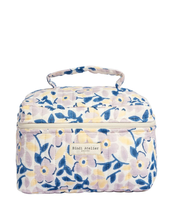 Blue floral quilted vanity case by Bindi Atelier with top handle and spacious zip storage