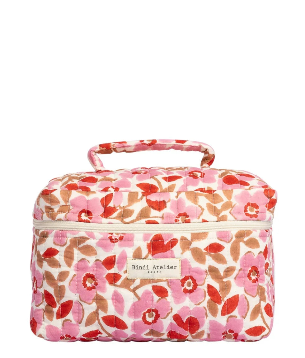 Pink floral quilted vanity case by Bindi Atelier with structured shape and top carry handle