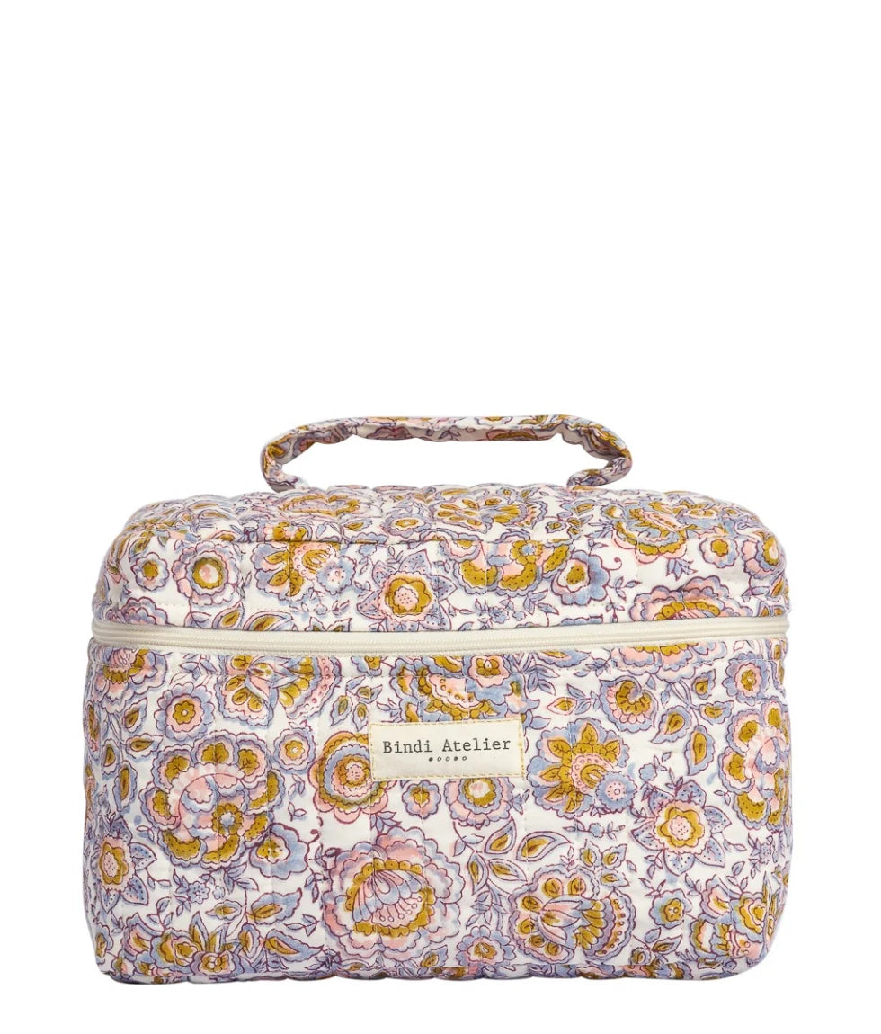 Quilted floral vanity case by Bindi Atelier with elegant pastel print and top carry handle