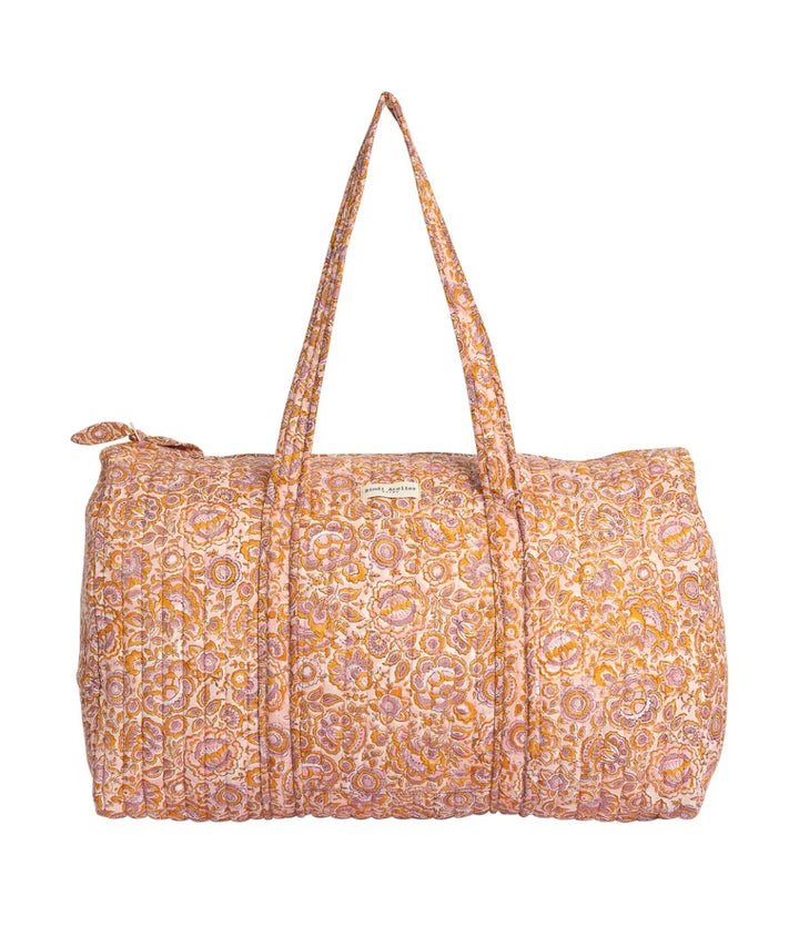 Pink floral quilted cotton weekender bag with padded handles and spacious overnight design
