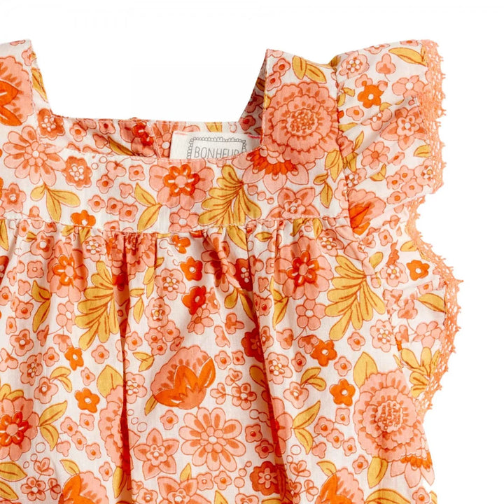 Bonheur du Jour Lionetta ecru rose floral baby romper with ruffle sleeves
